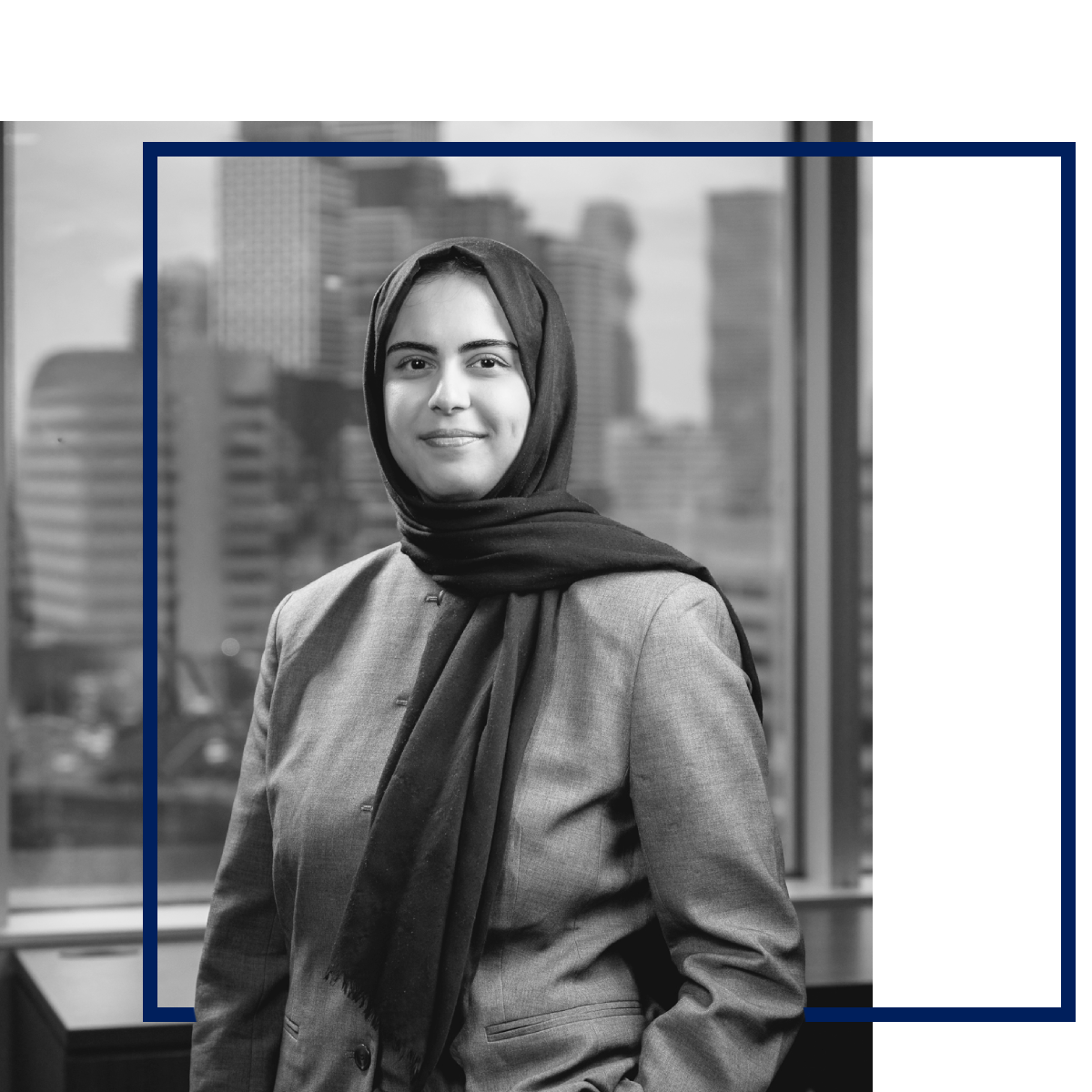 Female lawyer in Hijab smiling at camera